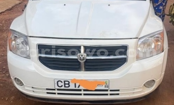 Ra Àlòkù Dodge Caliber funfun Ọkọ̀ in Cotonou ni Benin