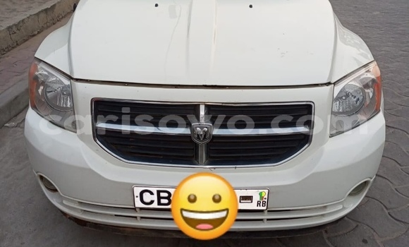 Ra Àlòkù Dodge Caliber funfun Ọkọ̀ in Cotonou ni Benin