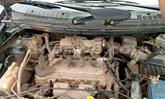 Buy Used Nissan Almera Tino Red Car in Cotonou in Benign Buy Used Nissan Almera Tino Red Car in Cotonou in Benign