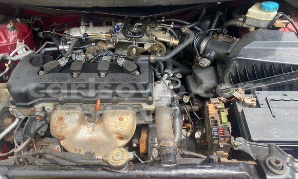 Sayi Na hannu Nissan Almera Tino Red Mota in Cotonou a Benin Sayi Na hannu Nissan Almera Tino Red Mota in Cotonou a Benin