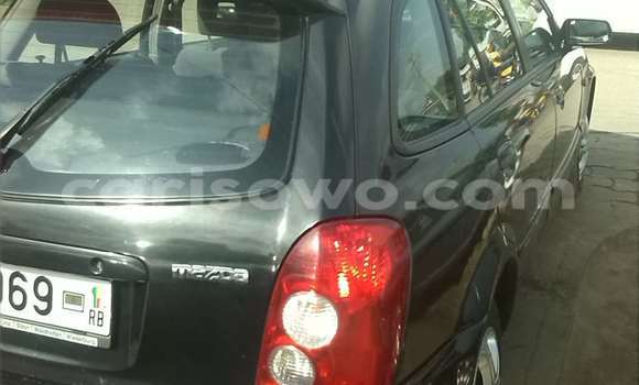 Sayi Na hannu Mazda 323 Black Mota in Cotonou a Benin Sayi Na hannu Mazda 323 Black Mota in Cotonou a Benin
