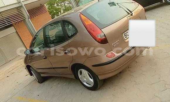 Sayi Na hannu Nissan Almera Tino Brown Mota in Cotonou a Benin