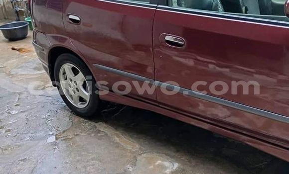 Acheter Occasion Voiture Nissan Almera Rouge à Cotonou, Benin Acheter Occasion Voiture Nissan Almera Rouge à Cotonou, Benin
