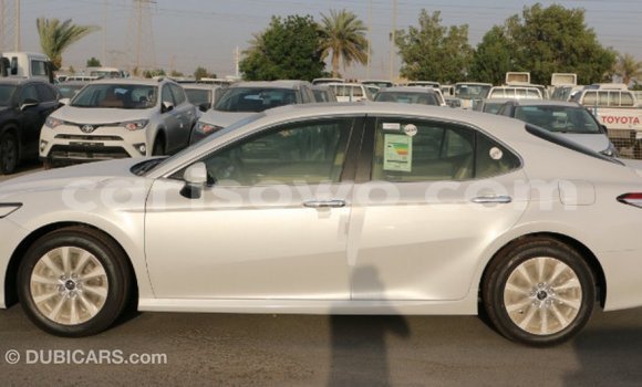 Acheter Import Voiture Toyota Camry Blanc à Import - Dubai, Benin Acheter Import Voiture Toyota Camry Blanc à Import - Dubai, Benin