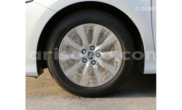 Acheter Import Voiture Toyota Camry Blanc à Import - Dubai, Benin Acheter Import Voiture Toyota Camry Blanc à Import - Dubai, Benin