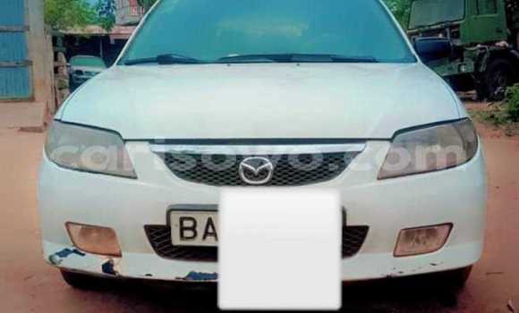 Sayi Na hannu Mazda 323 White Mota in Cotonou a Benin