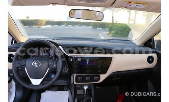 Sayi Imported Toyota Corolla White Mota in Import - Dubai a Benin Sayi Imported Toyota Corolla White Mota in Import - Dubai a Benin