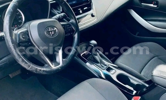 Sayi Na hannu Toyota Corolla White Mota in Cotonou a Benin Sayi Na hannu Toyota Corolla White Mota in Cotonou a Benin