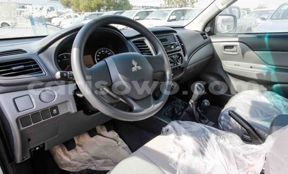 Buy Import Mitsubishi L200 White Car in Import - Dubai in Benign Buy Import Mitsubishi L200 White Car in Import - Dubai in Benign