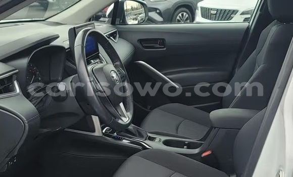 Sayi Na hannu Toyota Corolla Cross White Mota in Cotonou a Benin Sayi Na hannu Toyota Corolla Cross White Mota in Cotonou a Benin