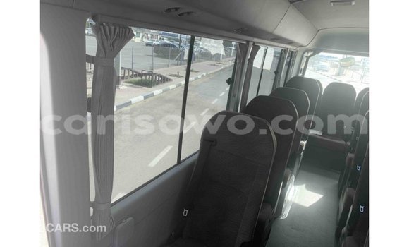 Sayi Imported Toyota Coaster White Babbar mota in Import - Dubai a Benin Sayi Imported Toyota Coaster White Babbar mota in Import - Dubai a Benin