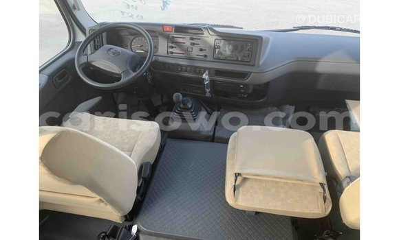 Sayi Imported Toyota Coaster White Babbar mota in Import - Dubai a Benin Sayi Imported Toyota Coaster White Babbar mota in Import - Dubai a Benin
