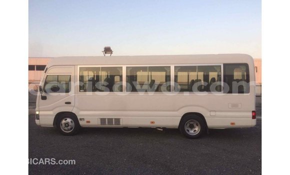 Sayi Imported Toyota Coaster White Babbar mota in Import - Dubai a Benin Sayi Imported Toyota Coaster White Babbar mota in Import - Dubai a Benin