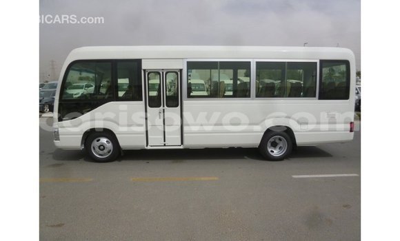 Acheter Import Utilitaire Toyota Coaster Blanc à Import - Dubai, Benin Acheter Import Utilitaire Toyota Coaster Blanc à Import - Dubai, Benin