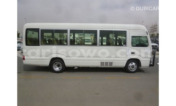 Acheter Import Utilitaire Toyota Coaster Blanc à Import - Dubai, Benin Acheter Import Utilitaire Toyota Coaster Blanc à Import - Dubai, Benin