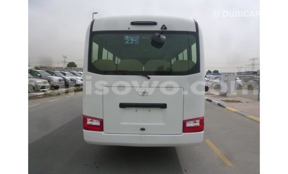 Acheter Import Utilitaire Toyota Coaster Blanc à Import - Dubai, Benin Acheter Import Utilitaire Toyota Coaster Blanc à Import - Dubai, Benin