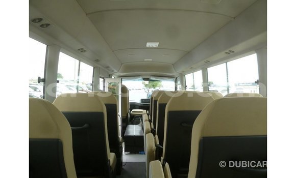 Acheter Import Utilitaire Toyota Coaster Blanc à Import - Dubai, Benin Acheter Import Utilitaire Toyota Coaster Blanc à Import - Dubai, Benin