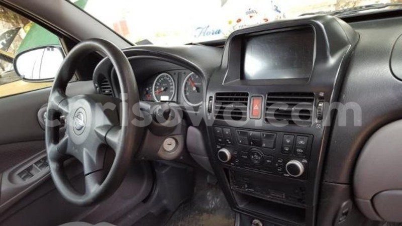 Big with watermark almera nissan grise annee 2004 3