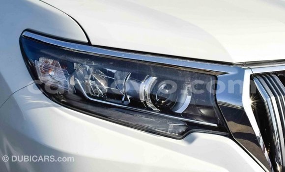 Acheter Import Voiture Toyota Prado Blanc à Import - Dubai, Benin Acheter Import Voiture Toyota Prado Blanc à Import - Dubai, Benin