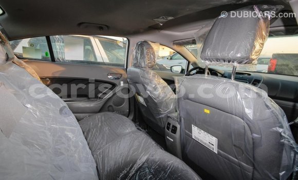 Acheter Import Voiture Kia Cerato Blanc à Import - Dubai, Benin Acheter Import Voiture Kia Cerato Blanc à Import - Dubai, Benin