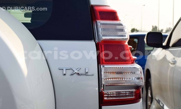 Sayi Imported Toyota Prado White Mota in Import - Dubai a Benin Sayi Imported Toyota Prado White Mota in Import - Dubai a Benin