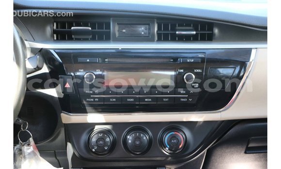 Acheter Import Voiture Toyota Corolla Blanc à Import - Dubai, Benin Acheter Import Voiture Toyota Corolla Blanc à Import - Dubai, Benin