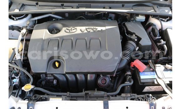 Acheter Import Voiture Toyota Corolla Blanc à Import - Dubai, Benin Acheter Import Voiture Toyota Corolla Blanc à Import - Dubai, Benin