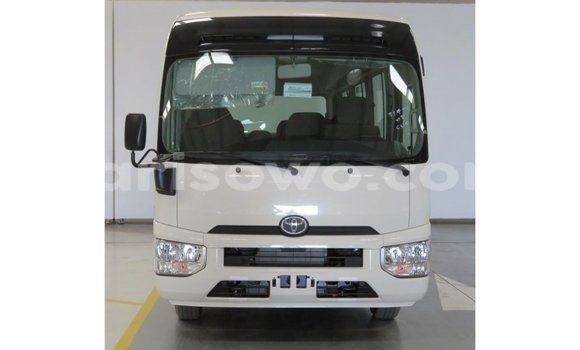 Sayi Imported Toyota Coaster White Babbar mota in Import - Dubai a Benin Sayi Imported Toyota Coaster White Babbar mota in Import - Dubai a Benin