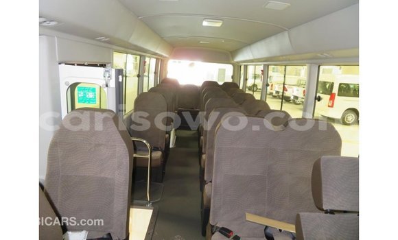 Sayi Imported Toyota Coaster White Babbar mota in Import - Dubai a Benin Sayi Imported Toyota Coaster White Babbar mota in Import - Dubai a Benin