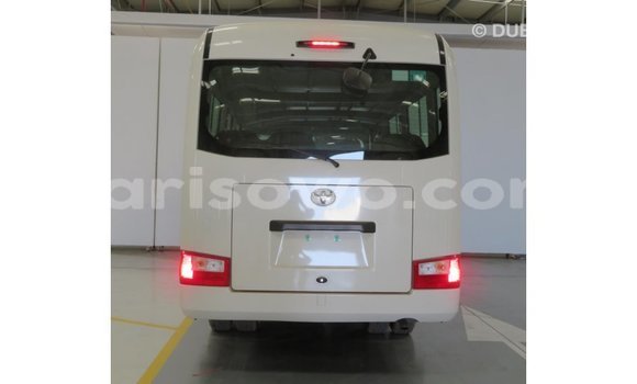 Sayi Imported Toyota Coaster White Babbar mota in Import - Dubai a Benin Sayi Imported Toyota Coaster White Babbar mota in Import - Dubai a Benin