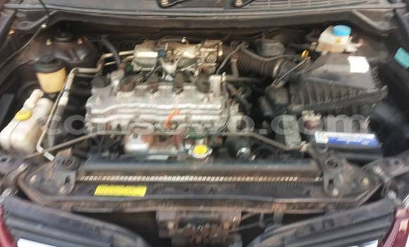 Buy New Nissan Tino Red Car in Cotonou in Benign Buy New Nissan Tino Red Car in Cotonou in Benign