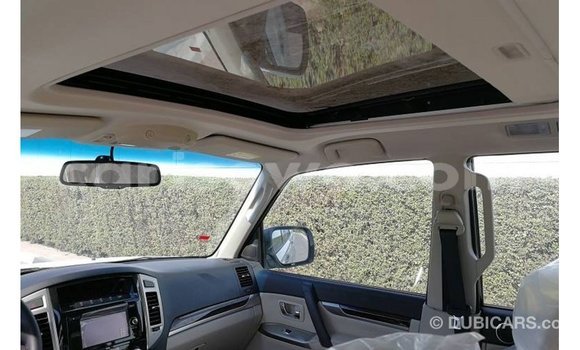 Acheter Import Voiture Mitsubishi Pajero Blanc à Import - Dubai, Benin Acheter Import Voiture Mitsubishi Pajero Blanc à Import - Dubai, Benin