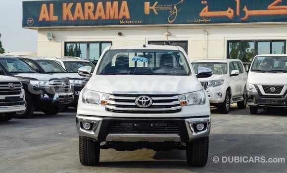 Sayi Imported Toyota Hilux White Mota in Import - Dubai a Benin Sayi Imported Toyota Hilux White Mota in Import - Dubai a Benin