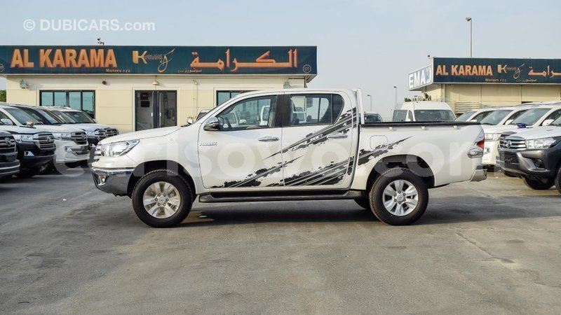 Big with watermark toyota hilux benin import dubai 6903