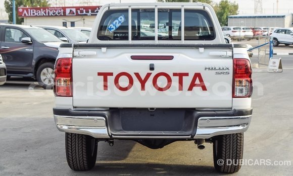 Sayi Imported Toyota Hilux White Mota in Import - Dubai a Benin Sayi Imported Toyota Hilux White Mota in Import - Dubai a Benin