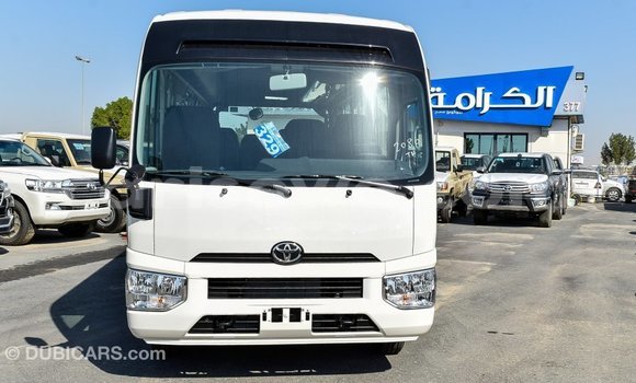 Sayi Imported Toyota Coaster White Babbar mota in Import - Dubai a Benin Sayi Imported Toyota Coaster White Babbar mota in Import - Dubai a Benin