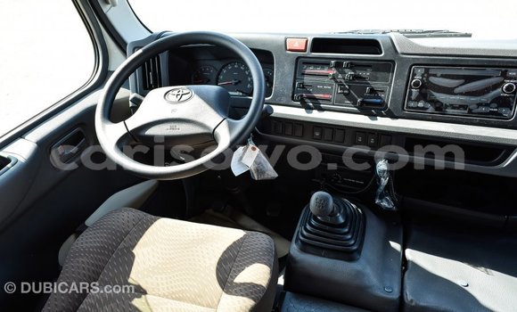 Sayi Imported Toyota Coaster White Babbar mota in Import - Dubai a Benin Sayi Imported Toyota Coaster White Babbar mota in Import - Dubai a Benin