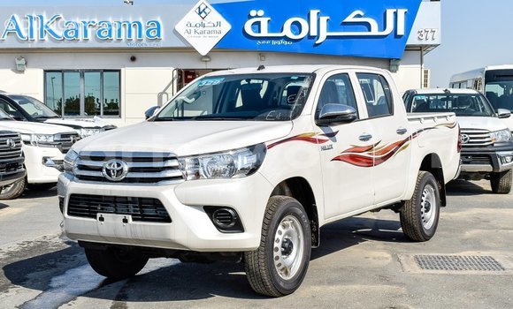 Sayi Imported Toyota Hilux White Mota in Import - Dubai a Benin Sayi Imported Toyota Hilux White Mota in Import - Dubai a Benin