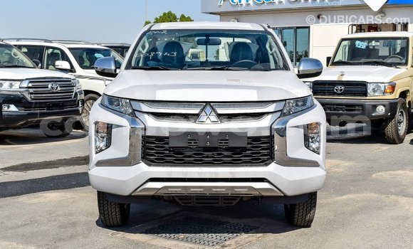 Sayi Imported Mitsubishi L200 White Mota in Import - Dubai a Benin Sayi Imported Mitsubishi L200 White Mota in Import - Dubai a Benin