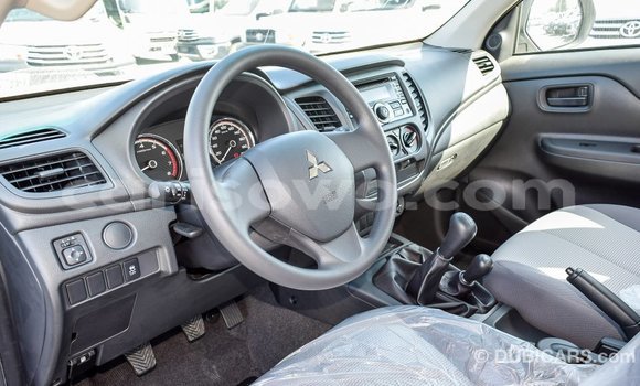 Sayi Imported Mitsubishi L200 White Mota in Import - Dubai a Benin Sayi Imported Mitsubishi L200 White Mota in Import - Dubai a Benin