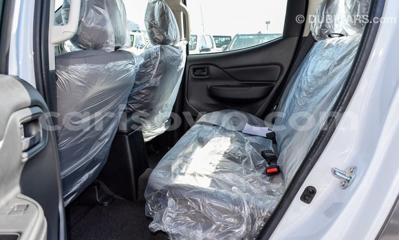 Sayi Imported Mitsubishi L200 White Mota in Import - Dubai a Benin Sayi Imported Mitsubishi L200 White Mota in Import - Dubai a Benin