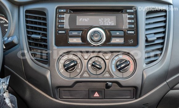 Sayi Imported Mitsubishi L200 White Mota in Import - Dubai a Benin Sayi Imported Mitsubishi L200 White Mota in Import - Dubai a Benin