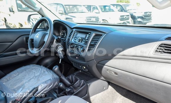 Sayi Imported Mitsubishi L200 White Mota in Import - Dubai a Benin Sayi Imported Mitsubishi L200 White Mota in Import - Dubai a Benin