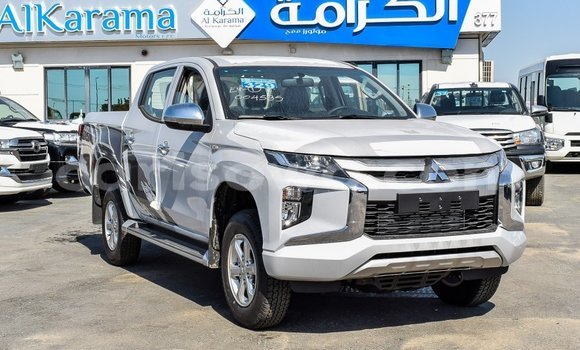 Sayi Imported Mitsubishi L200 White Mota in Import - Dubai a Benin Sayi Imported Mitsubishi L200 White Mota in Import - Dubai a Benin