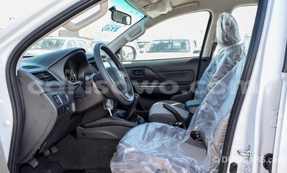 Sayi Imported Mitsubishi L200 White Mota in Import - Dubai a Benin Sayi Imported Mitsubishi L200 White Mota in Import - Dubai a Benin
