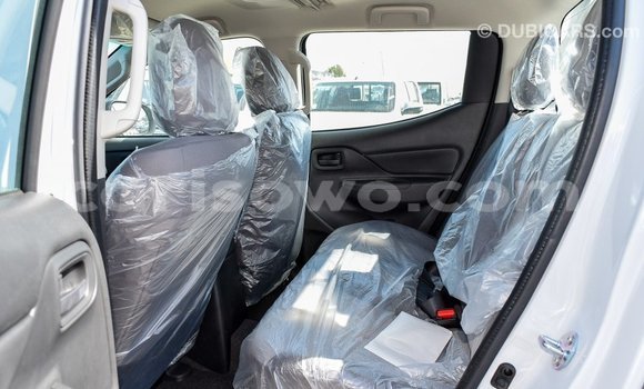 Sayi Imported Mitsubishi L200 White Mota in Import - Dubai a Benin Sayi Imported Mitsubishi L200 White Mota in Import - Dubai a Benin