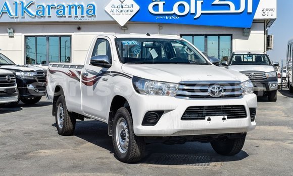 Sayi Imported Toyota Hilux White Mota in Import - Dubai a Benin Sayi Imported Toyota Hilux White Mota in Import - Dubai a Benin