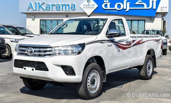 Sayi Imported Toyota Hilux White Mota in Import - Dubai a Benin Sayi Imported Toyota Hilux White Mota in Import - Dubai a Benin