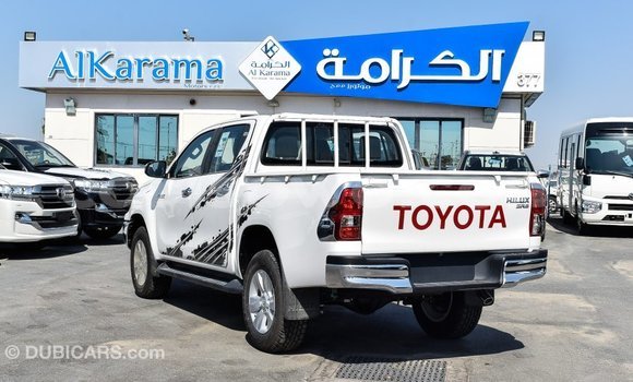 Sayi Imported Toyota Hilux White Mota in Import - Dubai a Benin Sayi Imported Toyota Hilux White Mota in Import - Dubai a Benin