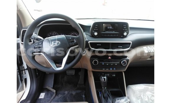 Sayi Imported Hyundai Tucson White Mota in Import - Dubai a Benin Sayi Imported Hyundai Tucson White Mota in Import - Dubai a Benin